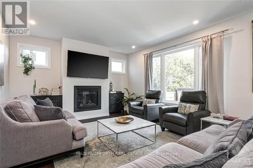 107 Rallidale Street, Ottawa, ON - Indoor Photo Showing Living Room With Fireplace