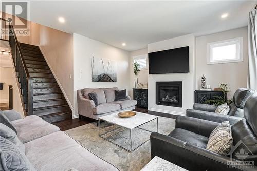 107 Rallidale Street, Ottawa, ON - Indoor Photo Showing Living Room With Fireplace