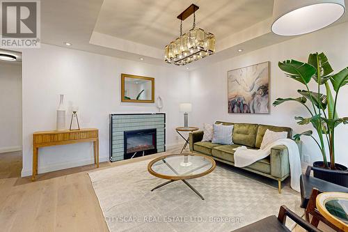 34 Stavely Crescent, Toronto (Rexdale-Kipling), ON - Indoor Photo Showing Living Room With Fireplace