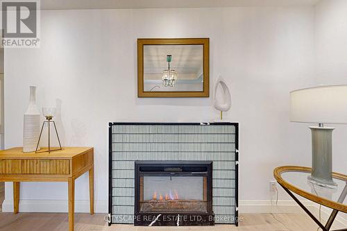 34 Stavely Crescent, Toronto (Rexdale-Kipling), ON - Indoor Photo Showing Other Room With Fireplace