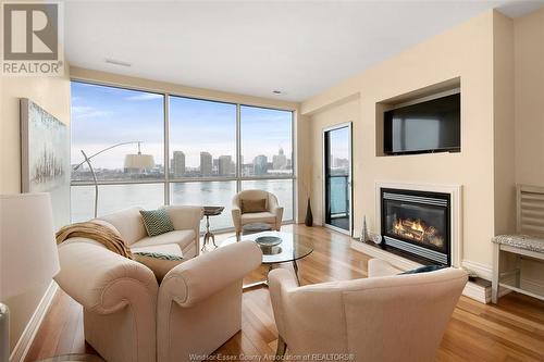 1225 Riverside Unit# 805, Windsor, ON - Indoor Photo Showing Living Room With Fireplace