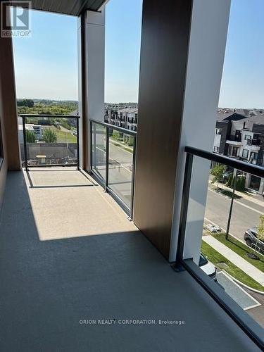 406 - 1440 Clarriage Court, Milton, ON - Outdoor With Balcony With View