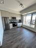 406 - 1440 Clarriage Court, Milton, ON  - Indoor Photo Showing Kitchen With Stainless Steel Kitchen 