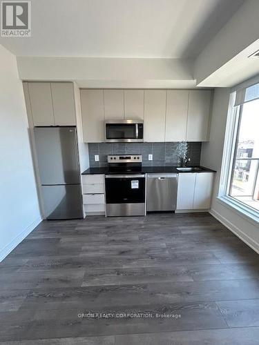 406 - 1440 Clarriage Court, Milton, ON - Indoor Photo Showing Kitchen With Stainless Steel Kitchen