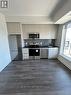 406 - 1440 Clarriage Court, Milton, ON  - Indoor Photo Showing Kitchen With Stainless Steel Kitchen 