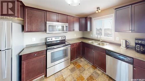 46 5004 James Hill Road, Regina, SK - Indoor Photo Showing Kitchen With Double Sink