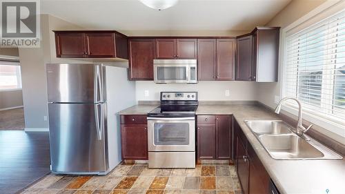 46 5004 James Hill Road, Regina, SK - Indoor Photo Showing Kitchen With Double Sink