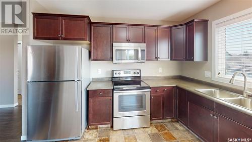 46 5004 James Hill Road, Regina, SK - Indoor Photo Showing Kitchen With Double Sink