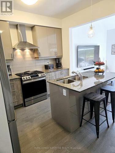 23 Eberhardt Drive, Wasaga Beach, ON - Indoor Photo Showing Kitchen With Double Sink With Upgraded Kitchen