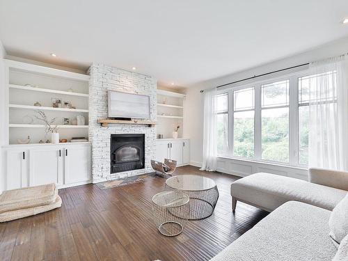 Living room - 42 Rue De Sorel, Blainville, QC - Indoor Photo Showing Living Room With Fireplace