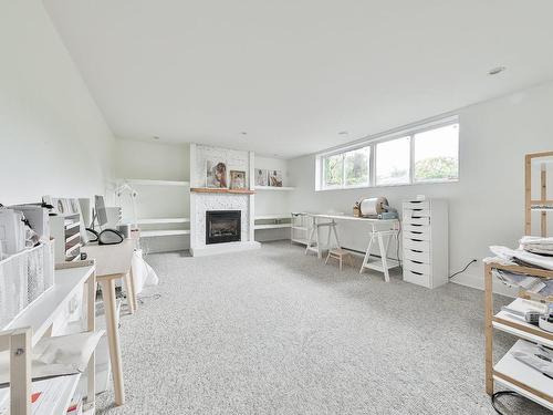 Family room - 42 Rue De Sorel, Blainville, QC - Indoor With Fireplace