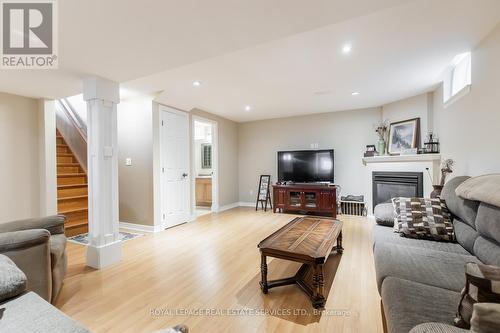 16 Geoffery Road, Norfolk (Port Dover), ON - Indoor Photo Showing Living Room With Fireplace