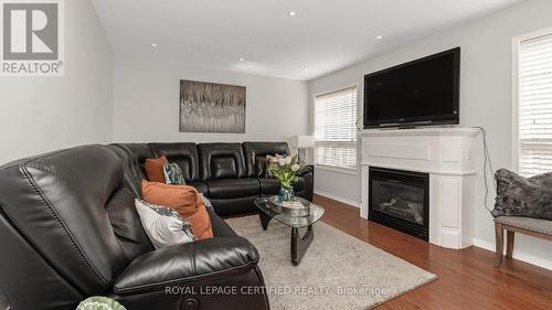 74 Earl Grey Crescent, Brampton (Fletcher'S Meadow), ON - Indoor Photo Showing Living Room With Fireplace