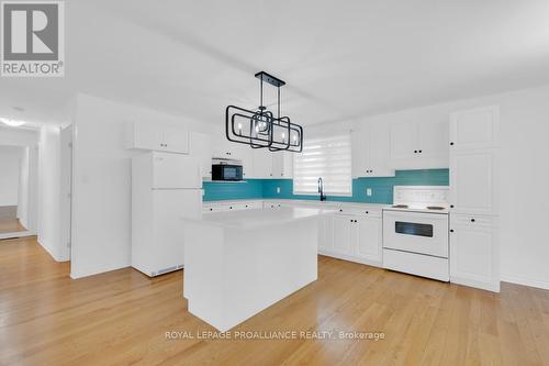 5 Eastern Avenue, Prince Edward County (Ameliasburgh), ON - Indoor Photo Showing Kitchen With Double Sink