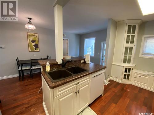 311 1St Avenue W, Kindersley, SK - Indoor Photo Showing Kitchen With Double Sink