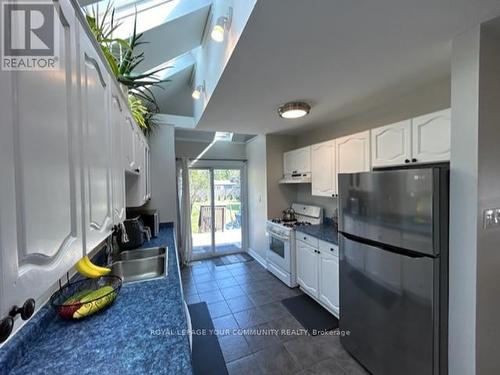 11 Della Street, Georgina, ON - Indoor Photo Showing Kitchen With Double Sink