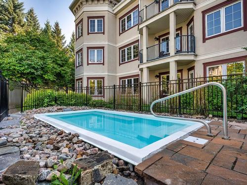 Spa - 302A-170 Ch. Du Curé-Deslauriers, Mont-Tremblant, QC - Outdoor With In Ground Pool With Balcony