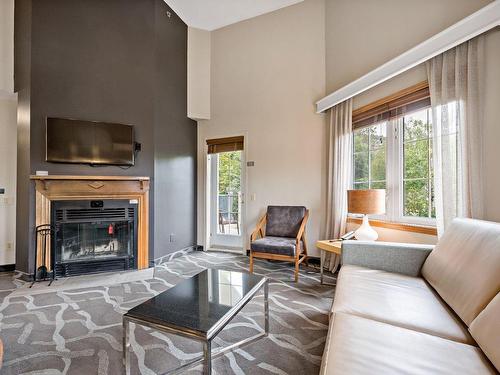 Salon - 302A-170 Ch. Du Curé-Deslauriers, Mont-Tremblant, QC - Indoor Photo Showing Living Room With Fireplace