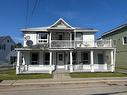 Frontage - 1021  - 1025 Ch. Du Golf, La Malbaie, QC  - Outdoor With Facade 