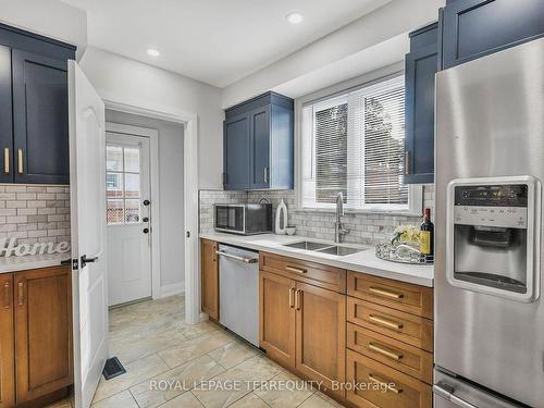 16 Mooregate Ave, Toronto, ON - Indoor Photo Showing Kitchen With Double Sink