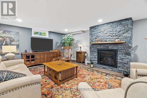 1514 Longwoods Road, Southwest Middlesex (Wardsville), ON - Indoor Photo Showing Living Room With Fireplace