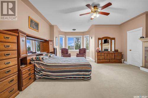 621 Brookhurst Court, Saskatoon, SK - Indoor Photo Showing Bedroom With Fireplace