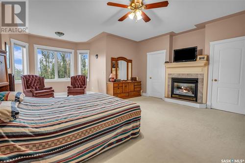 621 Brookhurst Court, Saskatoon, SK - Indoor Photo Showing Bedroom With Fireplace