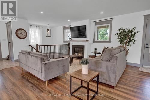 15519 Loyalist Parkway, Prince Edward County (Bloomfield), ON - Indoor Photo Showing Living Room With Fireplace