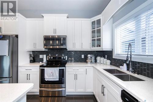 766 Labine Court, Saskatoon, SK - Indoor Photo Showing Kitchen With Double Sink With Upgraded Kitchen