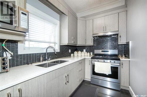 766 Labine Court, Saskatoon, SK - Indoor Photo Showing Kitchen With Double Sink