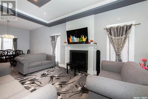 766 Labine Court, Saskatoon, SK - Indoor Photo Showing Living Room With Fireplace