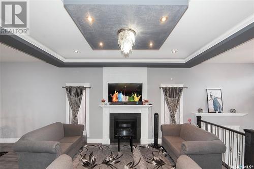 766 Labine Court, Saskatoon, SK - Indoor Photo Showing Living Room With Fireplace