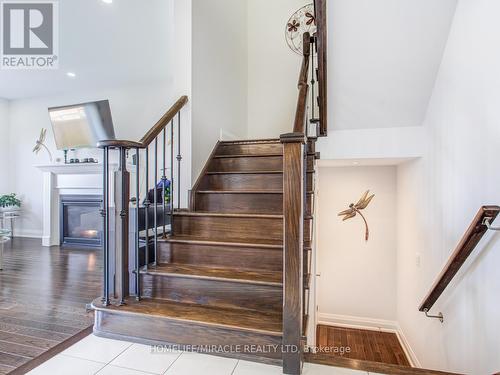 44 Festival Court S, East Gwillimbury, ON - Indoor Photo Showing Other Room With Fireplace