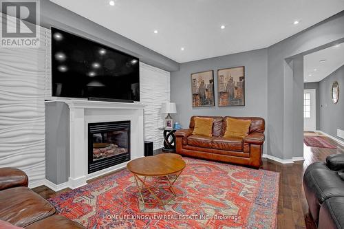 56 Carter Street, Bradford West Gwillimbury, ON - Indoor Photo Showing Living Room With Fireplace