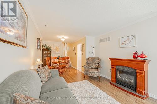 17A Cundles Road E, Barrie (Cundles East), ON - Indoor Photo Showing Living Room With Fireplace