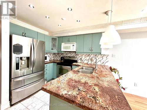 19 Warner Ave Avenue E, Toronto (Victoria Village), ON - Indoor Photo Showing Kitchen With Double Sink