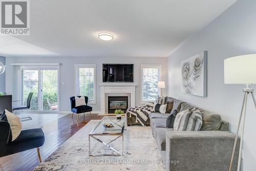 42 - 21 Muzzo Drive, Brampton (Sandringham-Wellington), ON - Indoor Photo Showing Living Room With Fireplace