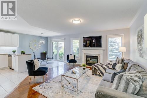 42 - 21 Muzzo Drive, Brampton (Sandringham-Wellington), ON - Indoor Photo Showing Living Room With Fireplace