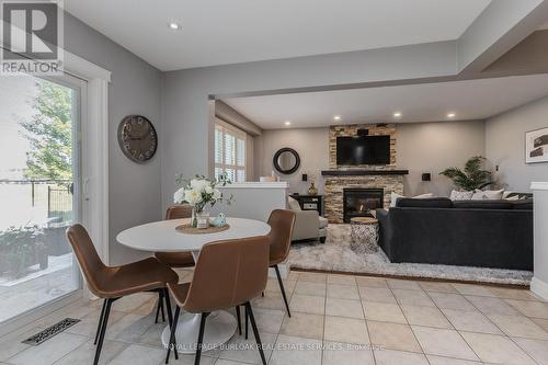 2440 Auckland Drive, Burlington, ON - Indoor Photo Showing Dining Room With Fireplace