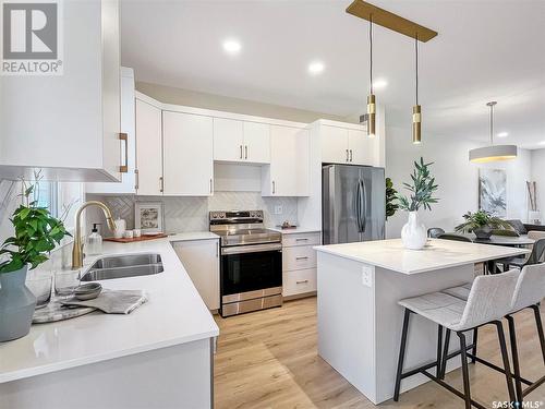 142 Taube Avenue, Saskatoon, SK - Indoor Photo Showing Kitchen With Double Sink With Upgraded Kitchen