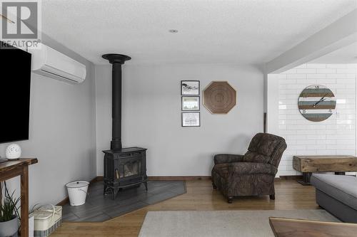 1093 Sunnyside Dr, Algoma Mills, ON - Indoor Photo Showing Living Room With Fireplace