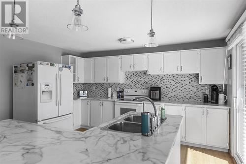 1093 Sunnyside Dr, Algoma Mills, ON - Indoor Photo Showing Kitchen With Double Sink