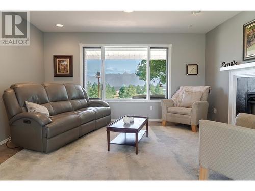 9617 Clearview  Road, Cranbrook, BC - Indoor Photo Showing Living Room With Fireplace