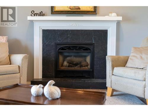 9617 Clearview  Road, Cranbrook, BC - Indoor Photo Showing Living Room With Fireplace