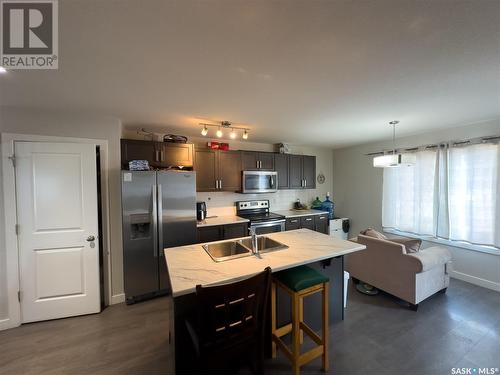 5568 Mckenna Road, Regina, SK - Indoor Photo Showing Kitchen With Stainless Steel Kitchen With Double Sink