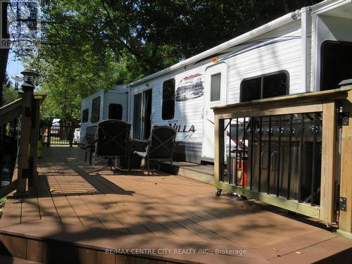 fenced in deck with gates on wheels - 49 - 22164 Valleyview Road, Thames Centre (Thorndale), ON 