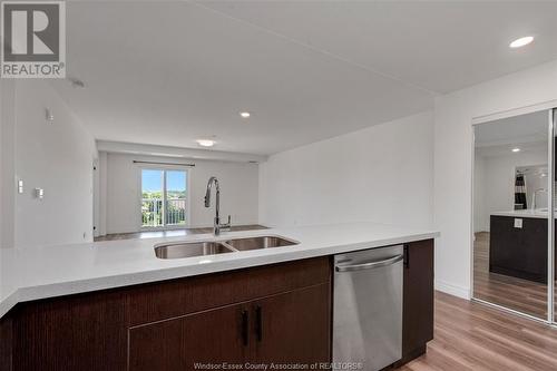 1611 Banwell Unit# 413, Windsor, ON - Indoor Photo Showing Kitchen With Double Sink