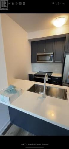 522 - 460 Dundas Street, Hamilton (Waterdown), ON - Indoor Photo Showing Kitchen With Stainless Steel Kitchen With Double Sink With Upgraded Kitchen