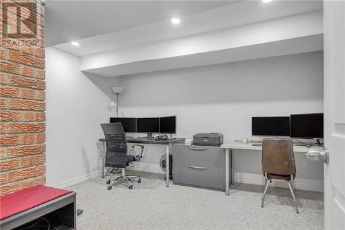 Lower level bedroom/office with cozy fireplace - 129 Spinnaker Way, Woodlawn, ON - Indoor Photo Showing Office