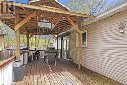 Walk out to your deck and gazebo from the patio door off the dining room for BBQ's and more - 